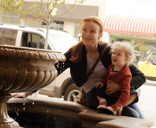 Desperate Housewives star Marcia Cross has a quiet moment with one of her twin daughters in Santa Monica, Ca