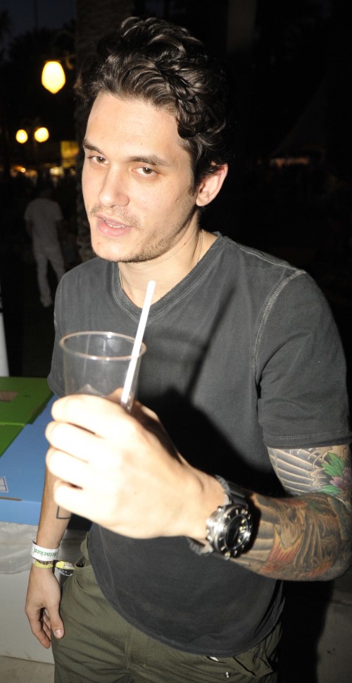 John Mayer chats with some women at the bar on Day 1 of the Coachella Music Festival in Indio, Ca