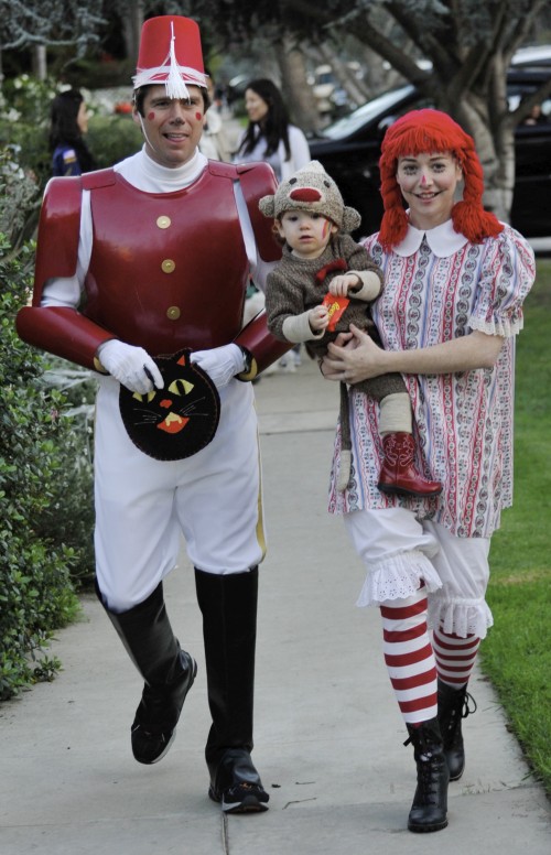 Alyson Hannigan dressed as Raggedy Anne and her husband Alexis Denisoff as a toy soldier take their daughter Satyana Trick or Treating in Santa Monica, Ca